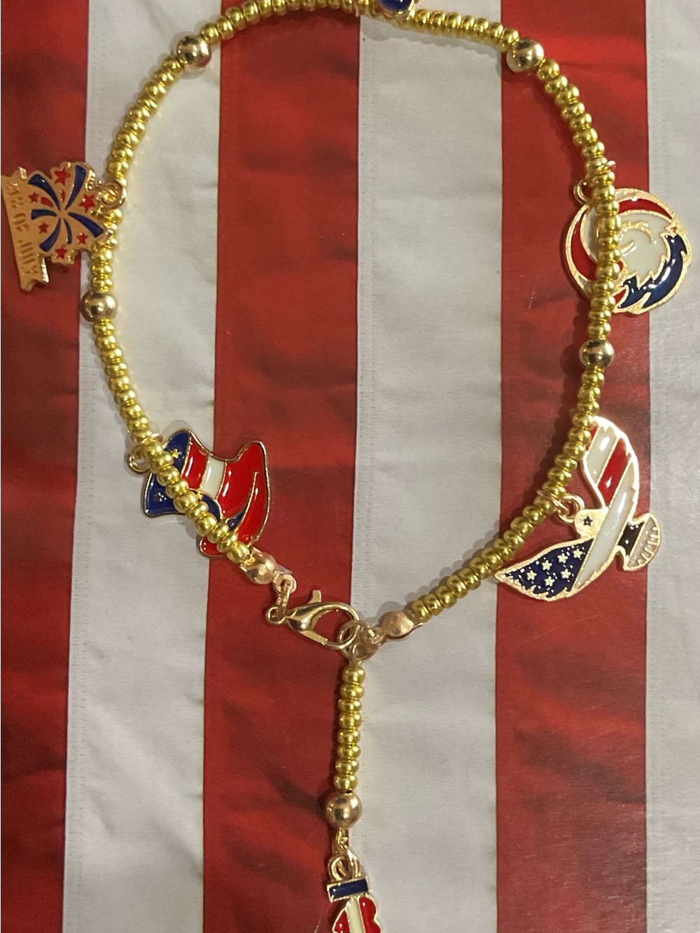 Lulu's Gold-Tone Patriotic Charm Necklace with Red, White & Blue Accents
